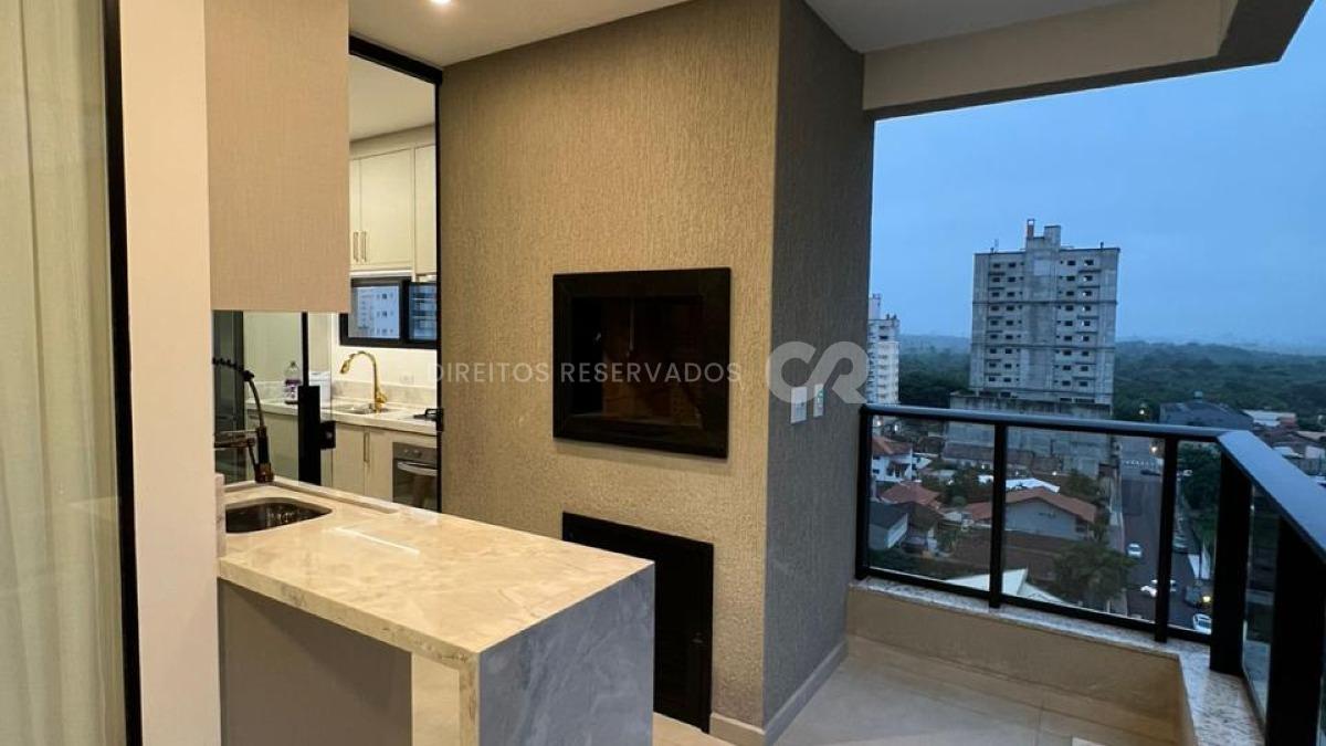Apartamento com 3 suítes no edifício Porto Vitória na Meia Praia em Itapema