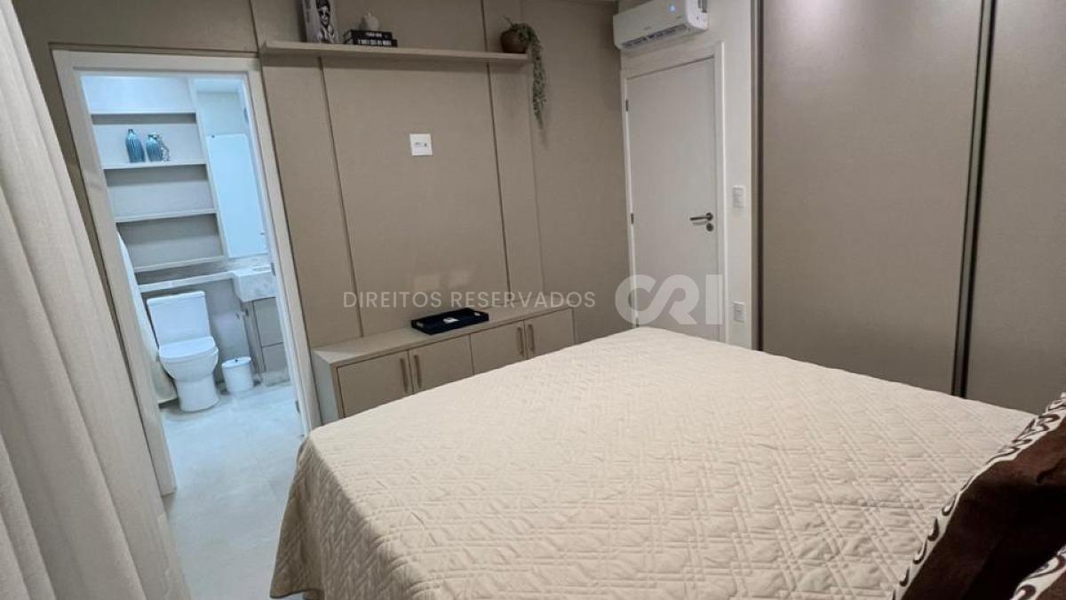 Apartamento com 3 suítes no edifício Porto Vitória na Meia Praia em Itapema