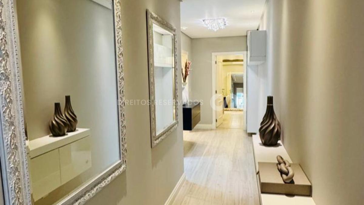 Apartamento no Edifício Atlantic Paradise Towers com 04 Suítes na Meia Praia em Itapema