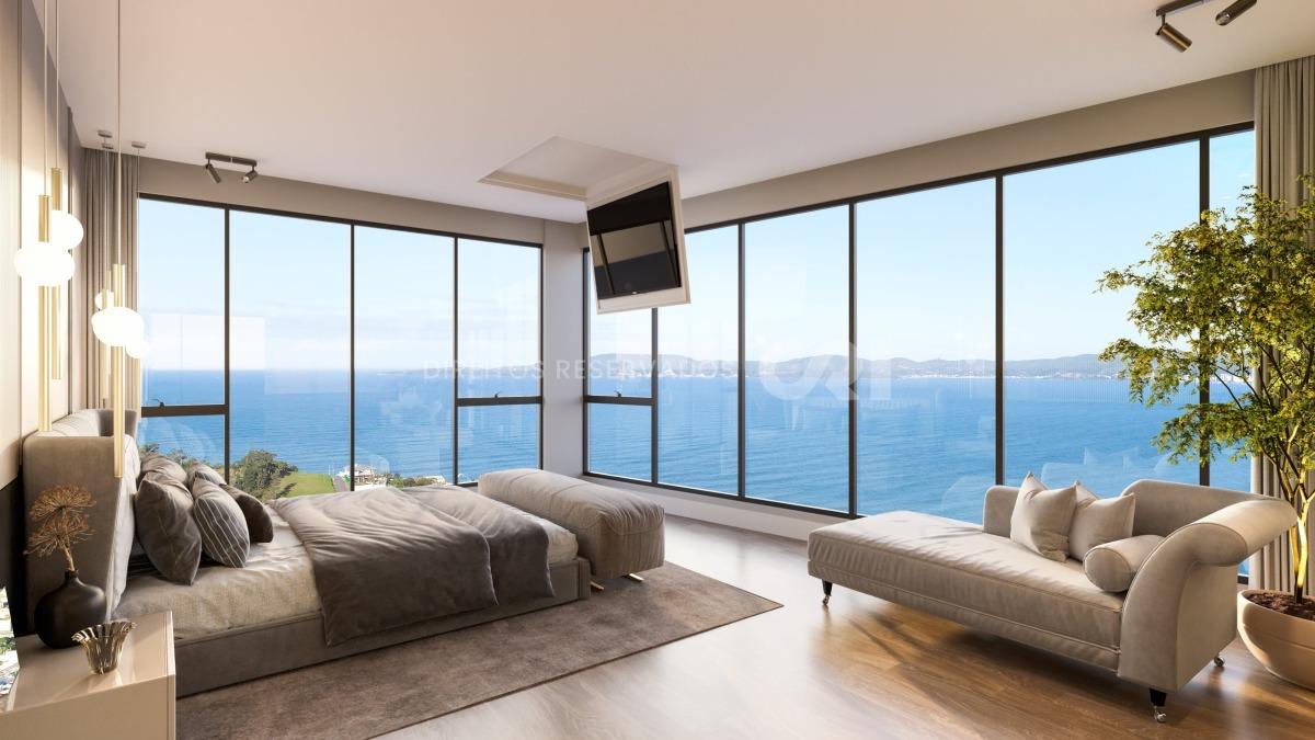 Apartamento frente mar com 4 suítes no Edifício Celine no Canto da Praia em Itapema