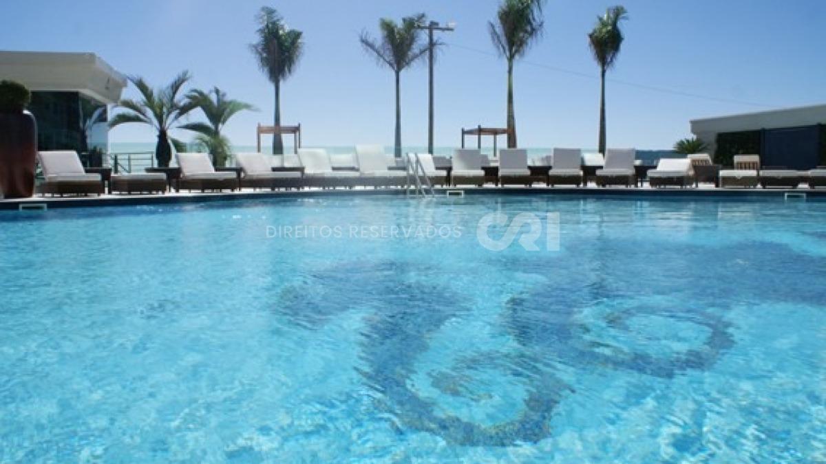Apartamento frente mar com 4 suítes no Atlantic Paradise Towers na Meia Praia em Itapema