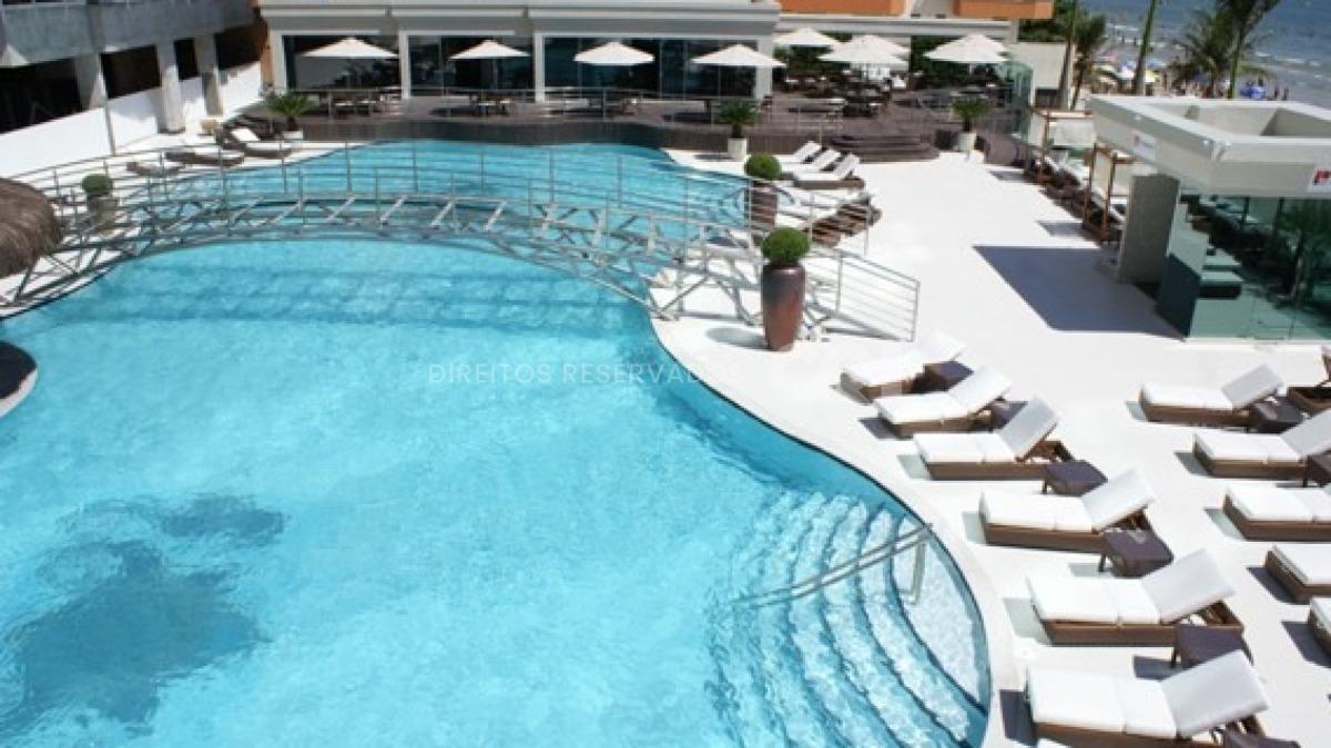 Apartamento frente mar com 4 suítes no Atlantic Paradise Towers na Meia Praia em Itapema